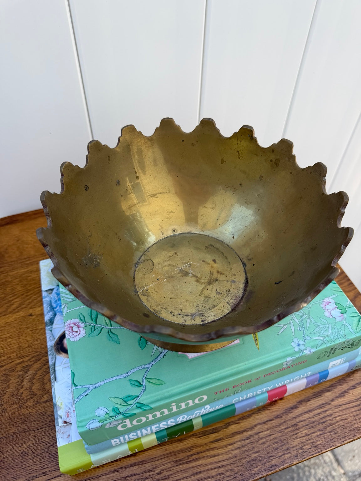 Interior of brass crown-rim bowl showing patina