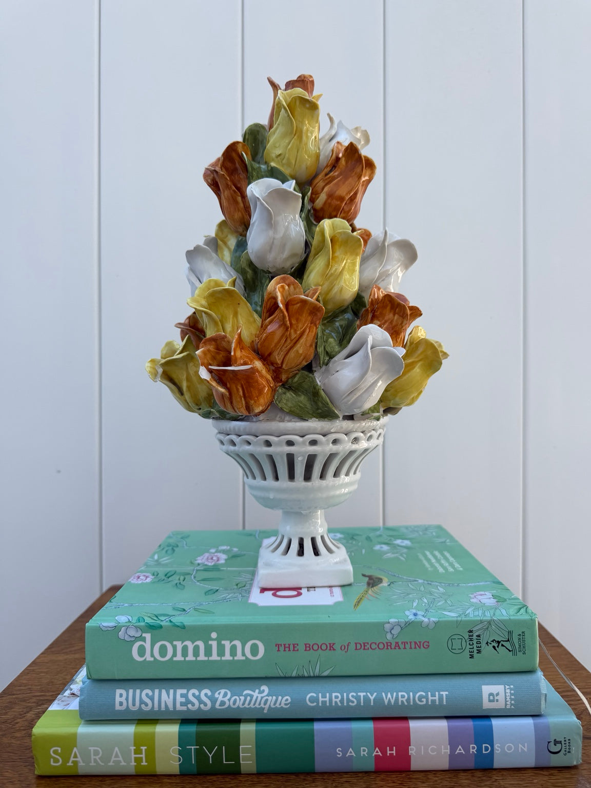 Ceramic tulip topiary in white pedestal urn, view 2