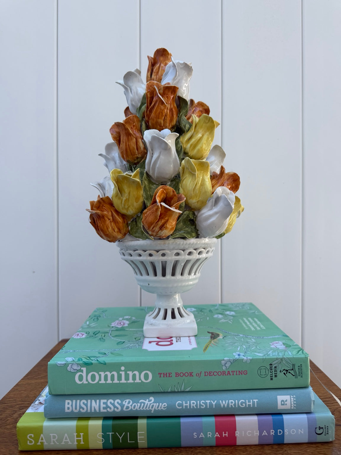 Ceramic tulip topiary in white pedestal urn, view 4