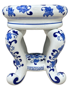 Blue and white floral ceramic stand, front view