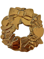 Brass Christmas wreath trivet with bow and foliage
