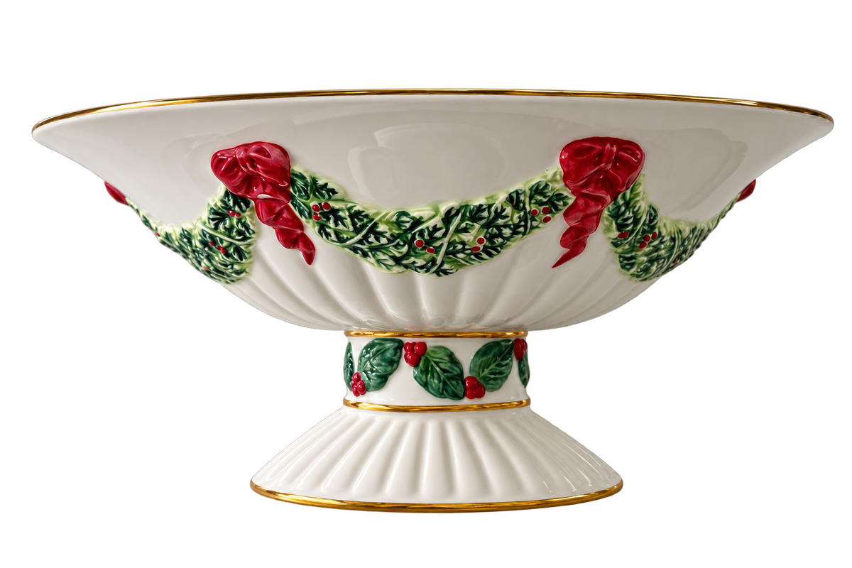 Christmas pedestal bowl with holly garland, red bows and gold trim, front view