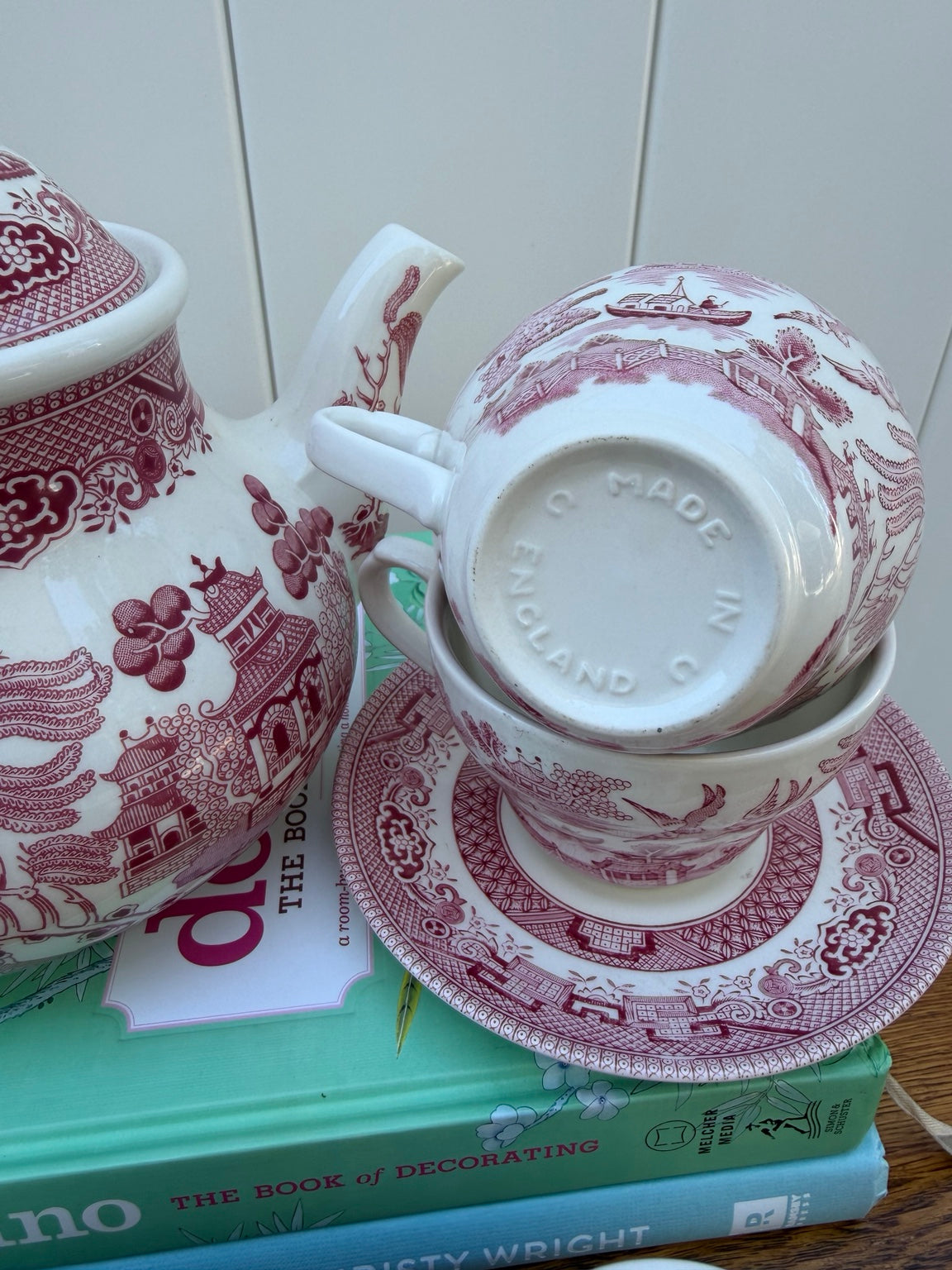 Cup underside with Made in England mark and detail of the teapot spout