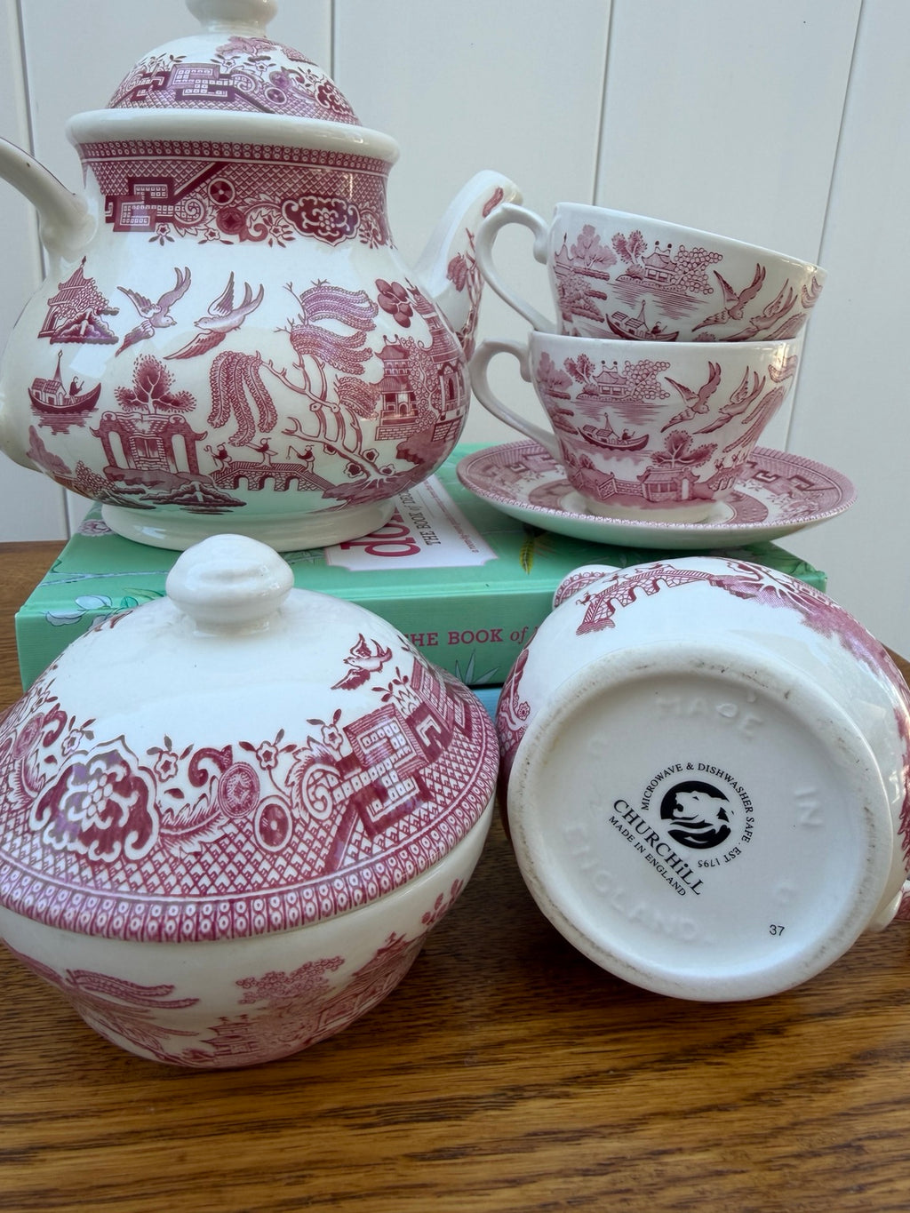 Churchill maker's mark on creamer with tea set in background