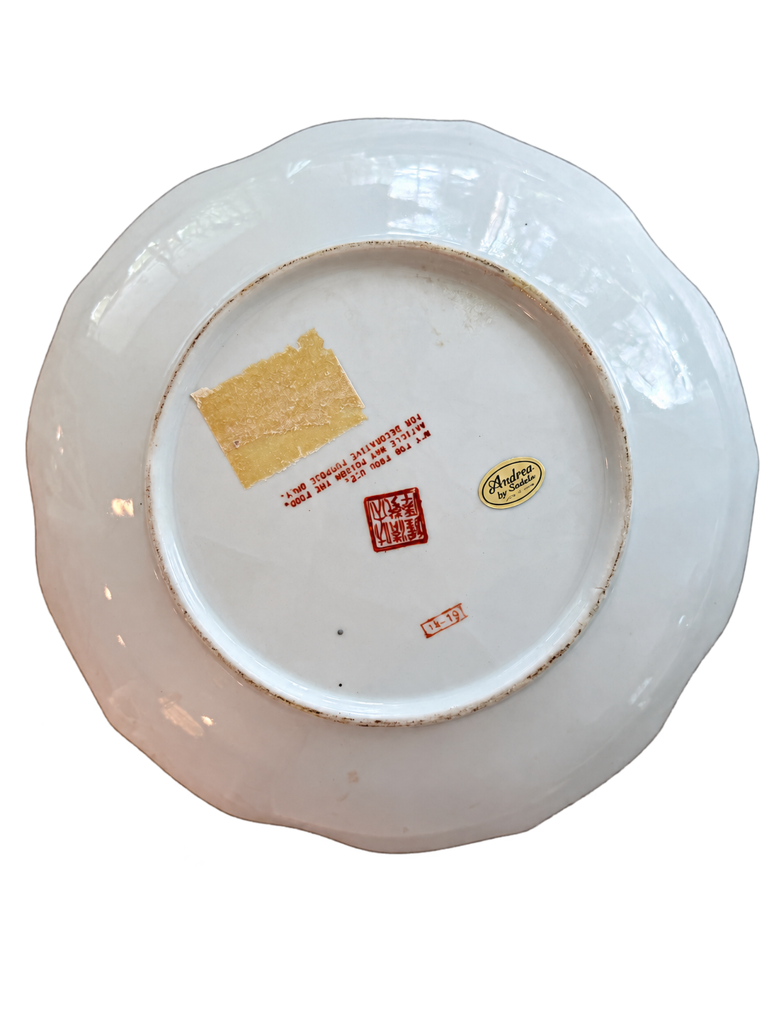 Plate underside showing Andrea by Sadek label and decorative-use-only marking