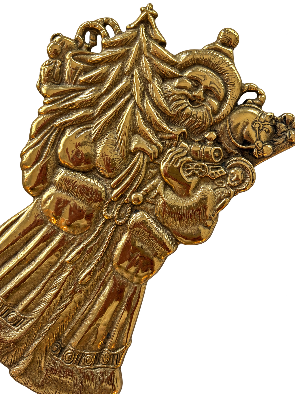 Detail of Father Christmas brass trivet with tree and toys