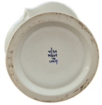 Italian ceramic urn with yellow flowers — base