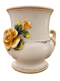 Italian ceramic urn with yellow flowers — front