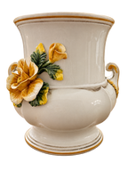 Italian ceramic urn with yellow flowers — front