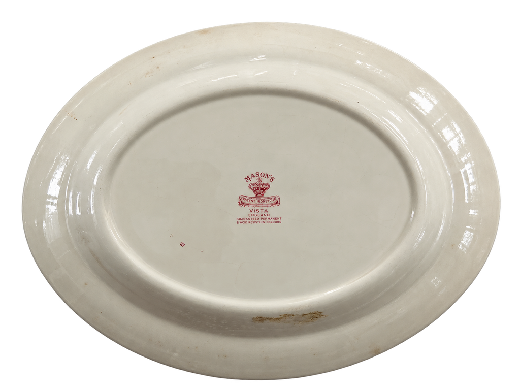 Back of Mason's Vista platter with maker's mark and vintage wear
