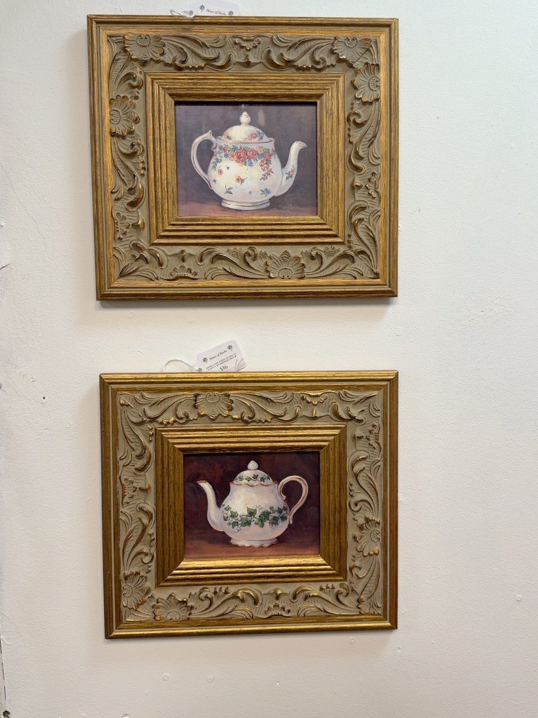 Framed teapot prints: floral design at top and ivy design at bottom, $16 each