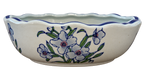 Oval porcelain bowl with blue scalloped rim, green leaves and floral decoration