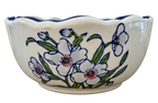 Oval porcelain bowl with blue scalloped rim, green leaves and floral decoration