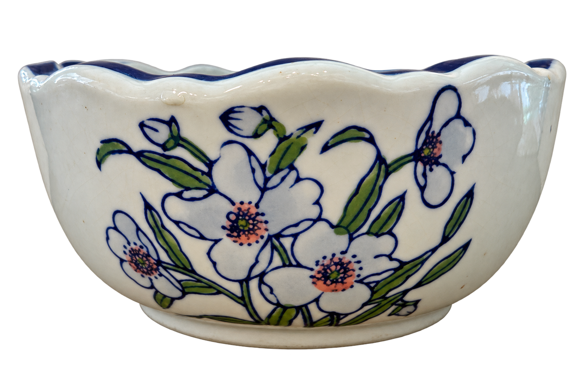Oval porcelain bowl with blue scalloped rim, green leaves and floral decoration