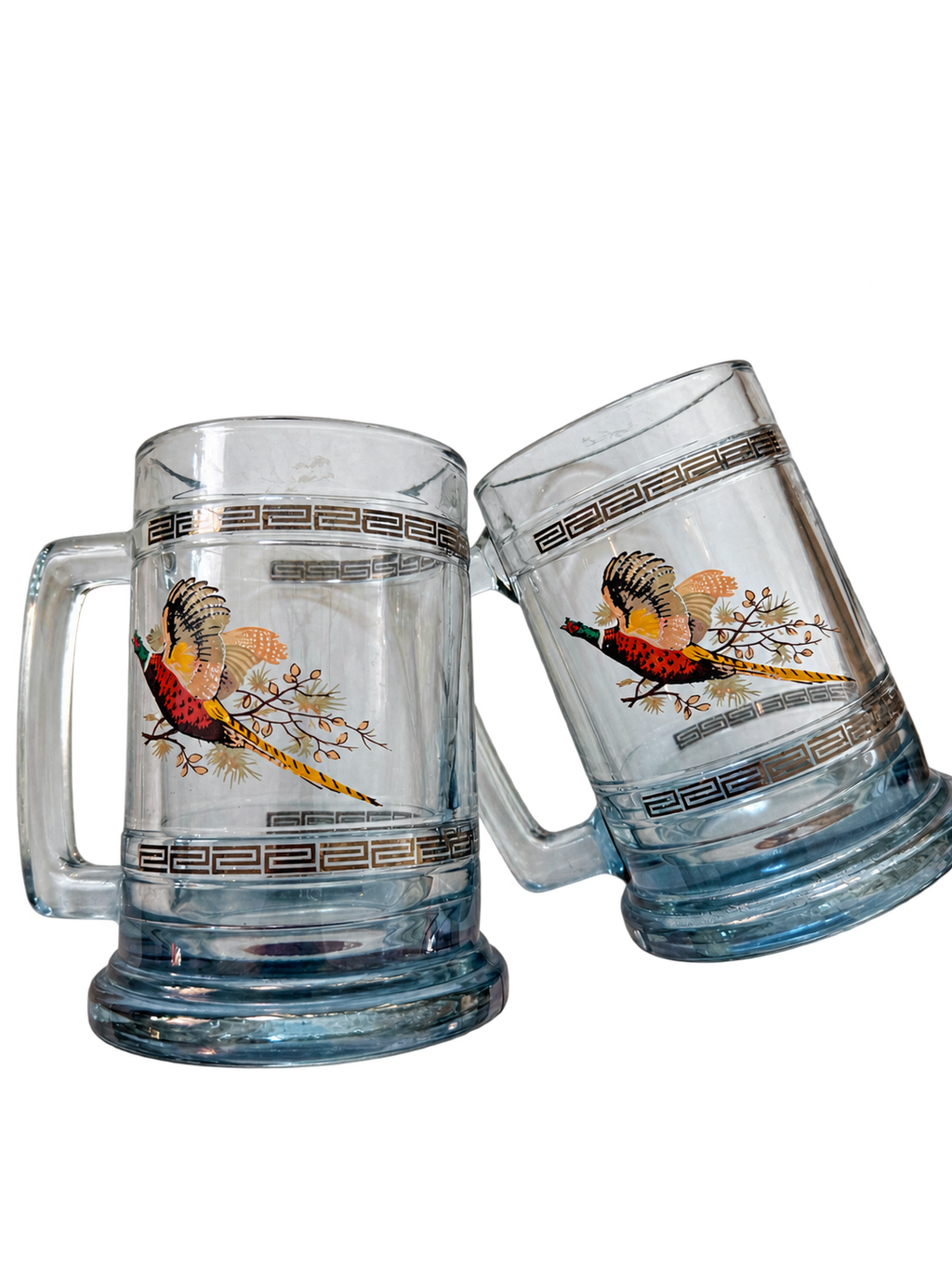 Vintage pheasant glass beer mugs with Greek key trim, pair angled view
