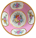 Pink floral bowl with gold detailing, overhead view