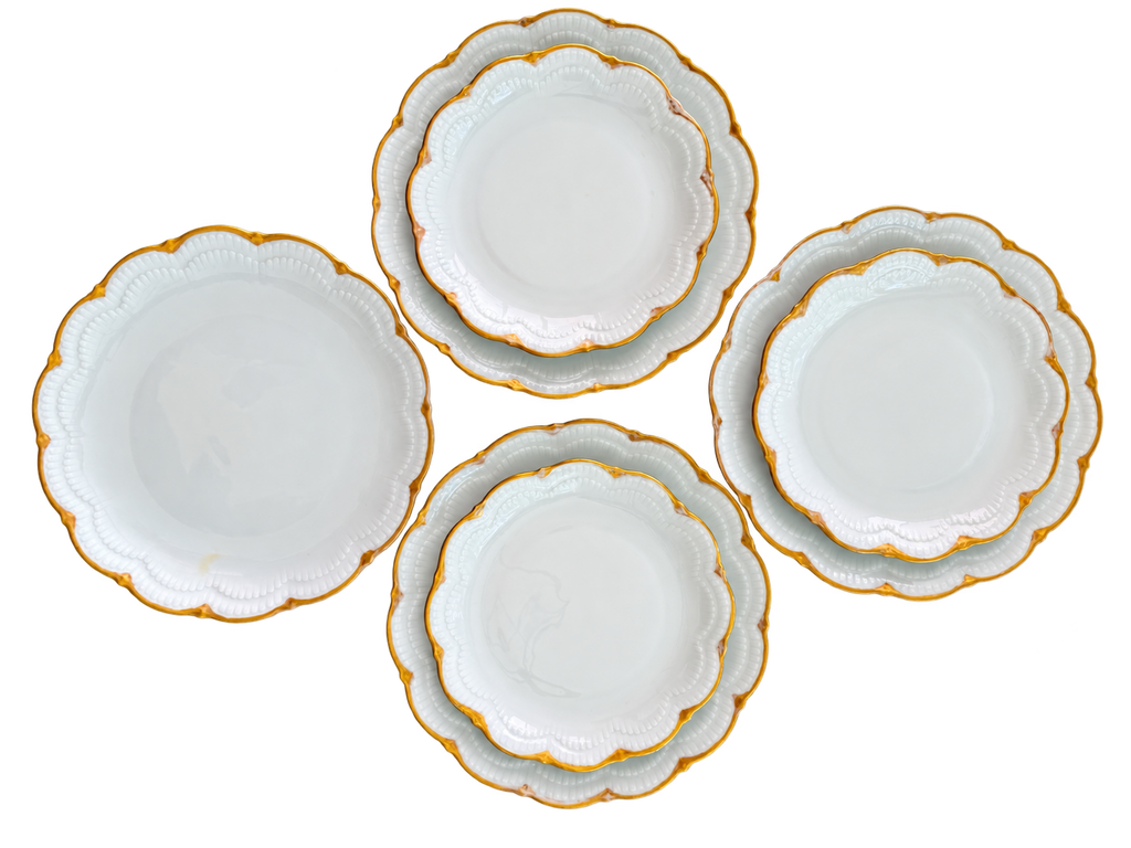 Seven white and gold Schirnding Bavaria plates, four 9.5 inch and three 7.5 inch