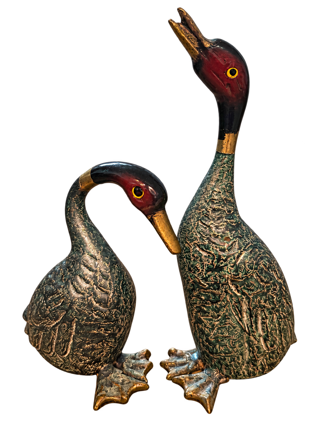 Pair of vintage painted metal duck figurines