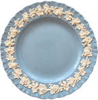 Wedgwood blue and cream grapevine plate front with visible crazing