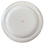 Wedgwood plate underside with background removed; maker marks and condition visible