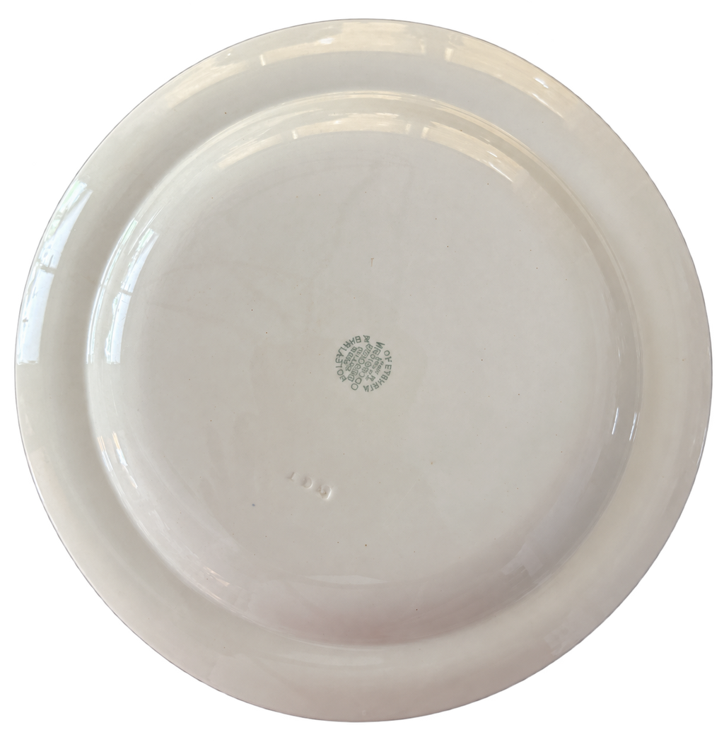 Wedgwood plate underside with background removed; maker marks and condition visible