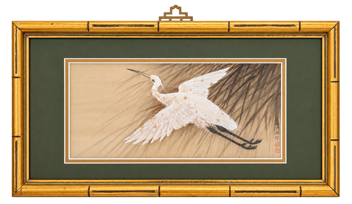 White bird in flight with olive green mat and gold faux-bamboo frame, 19 inches wide by 11 inches high