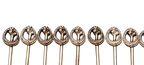 Close-up of wreath and botanical finials on the cocktail picks